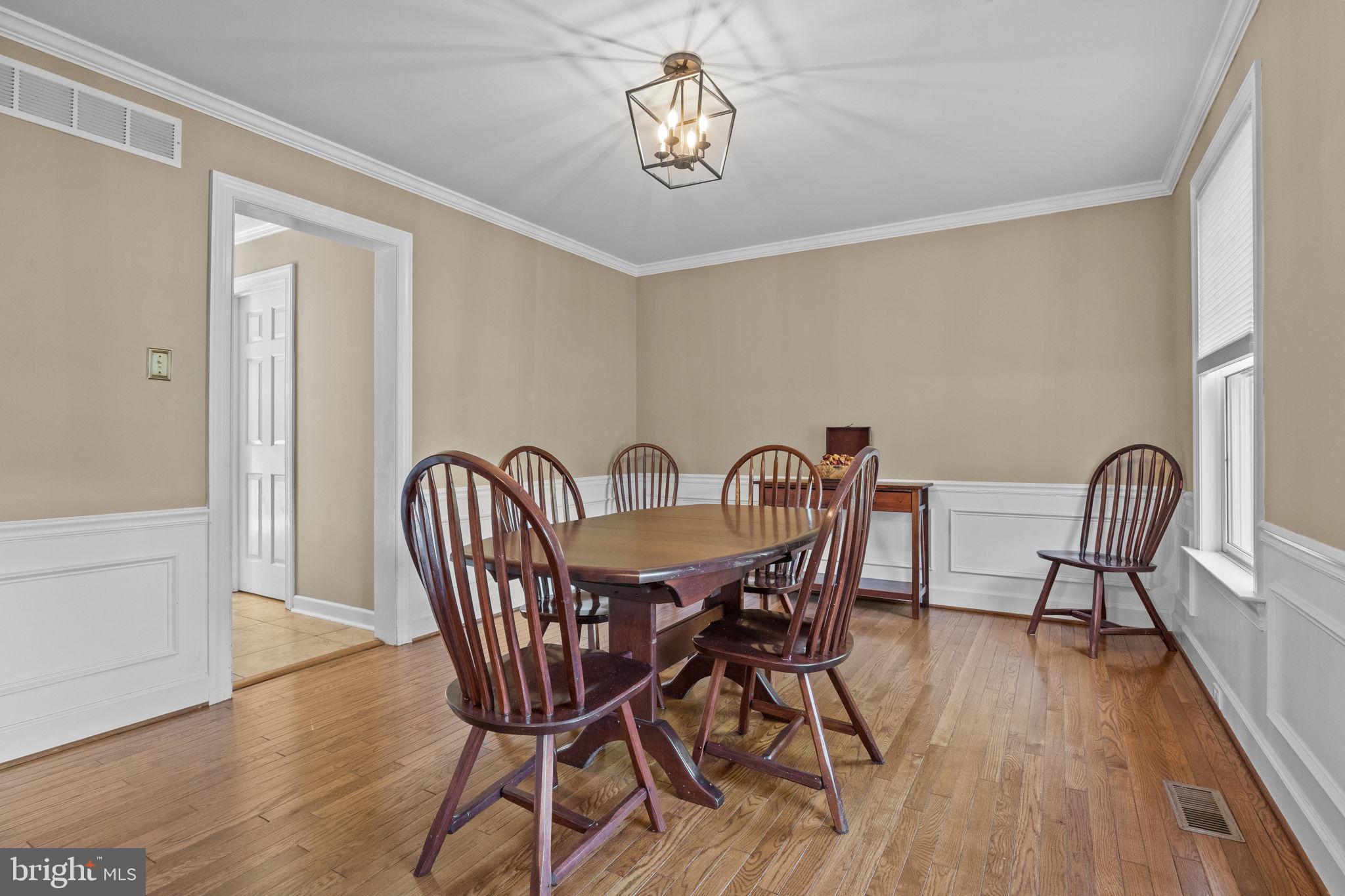 275 West Sandy Ridge Road Doylestown, PA 18901 - Photo 17 of 54 a view of a dining room with furniture wooden floor and a carpet