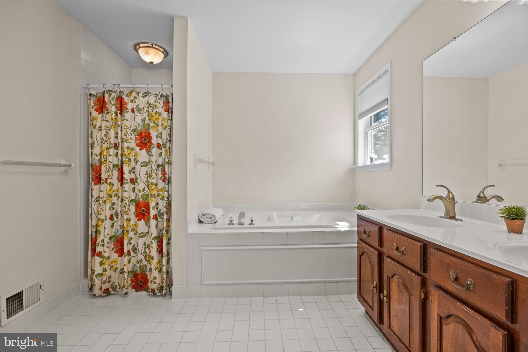 275 West Sandy Ridge Road Doylestown, PA 18901 - Photo 25 of 54 a bathroom with a sink a toilet and a shower