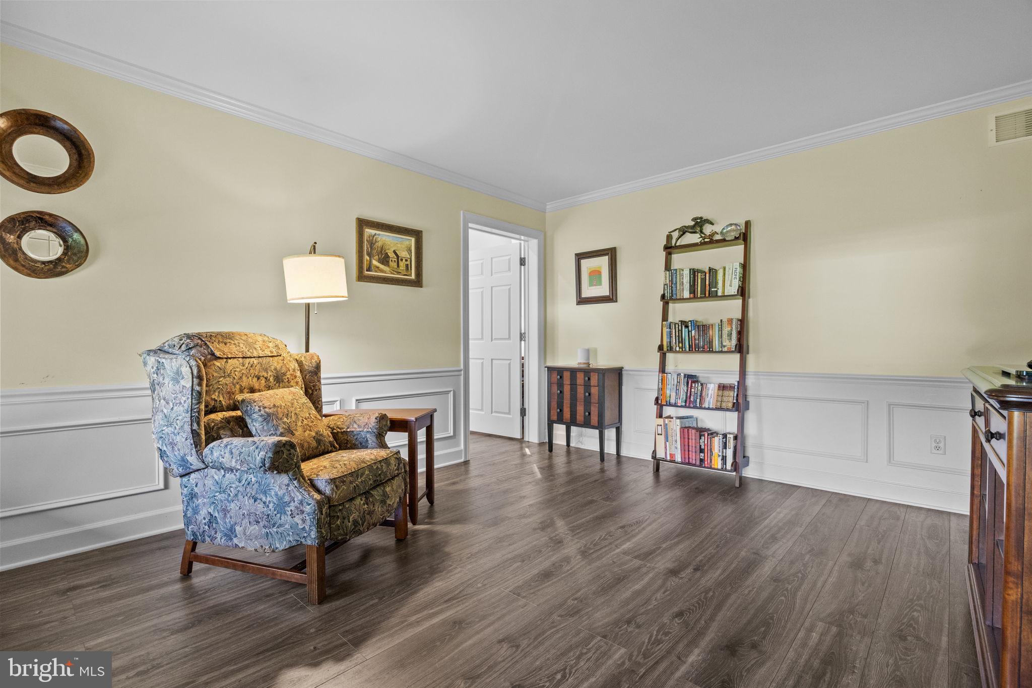 275 West Sandy Ridge Road Doylestown, PA 18901 - Photo 30 of 54 a living room with furniture and wooden floor