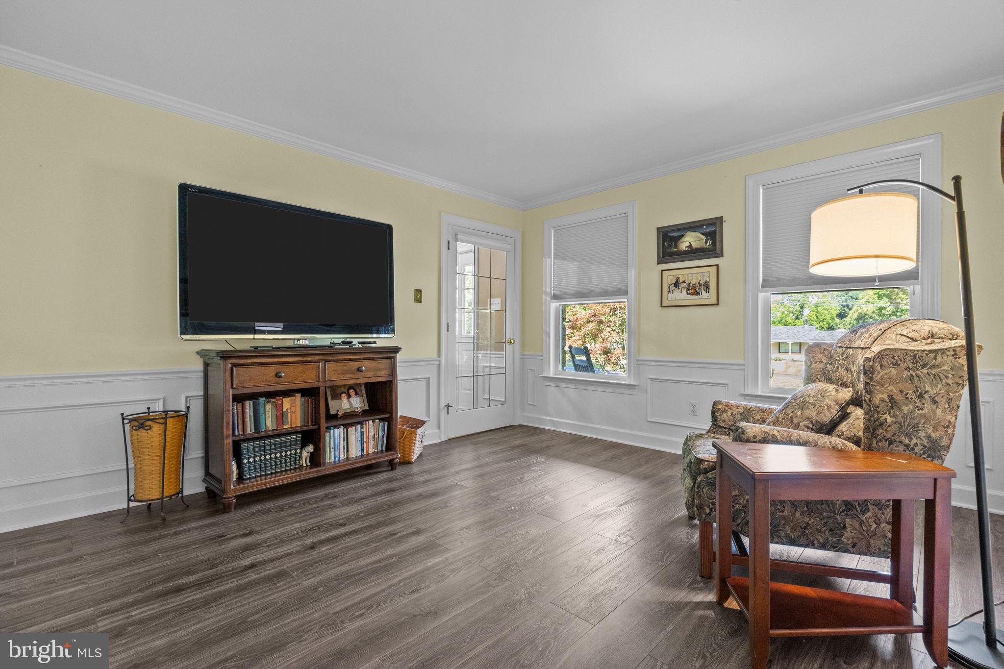 275 West Sandy Ridge Road Doylestown, PA 18901 - Photo 31 of 54 a living room with furniture and a flat screen tv
