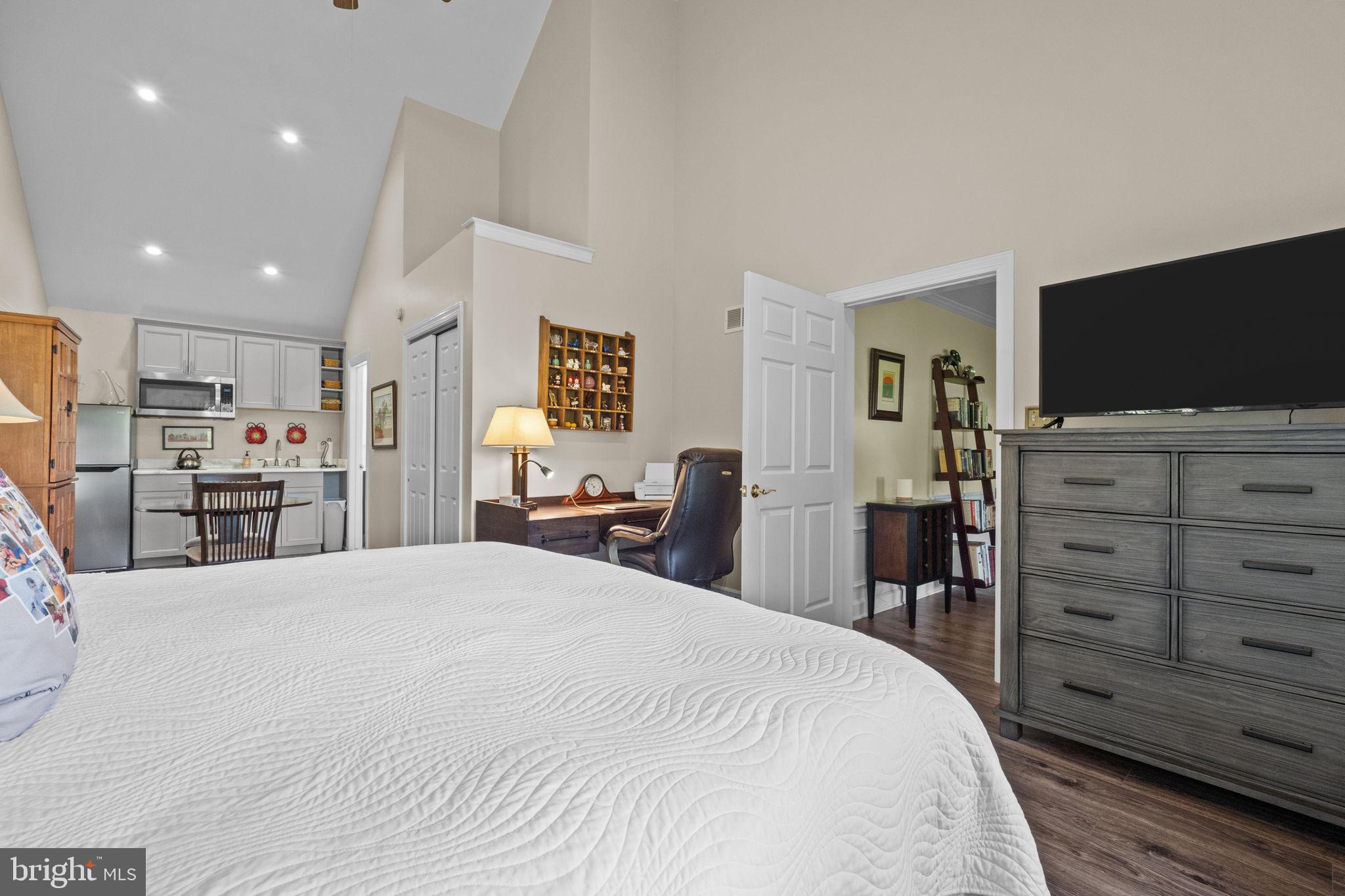 275 West Sandy Ridge Road Doylestown, PA 18901 - Photo 33 of 54 a large bedroom with a bed and flat screen tv