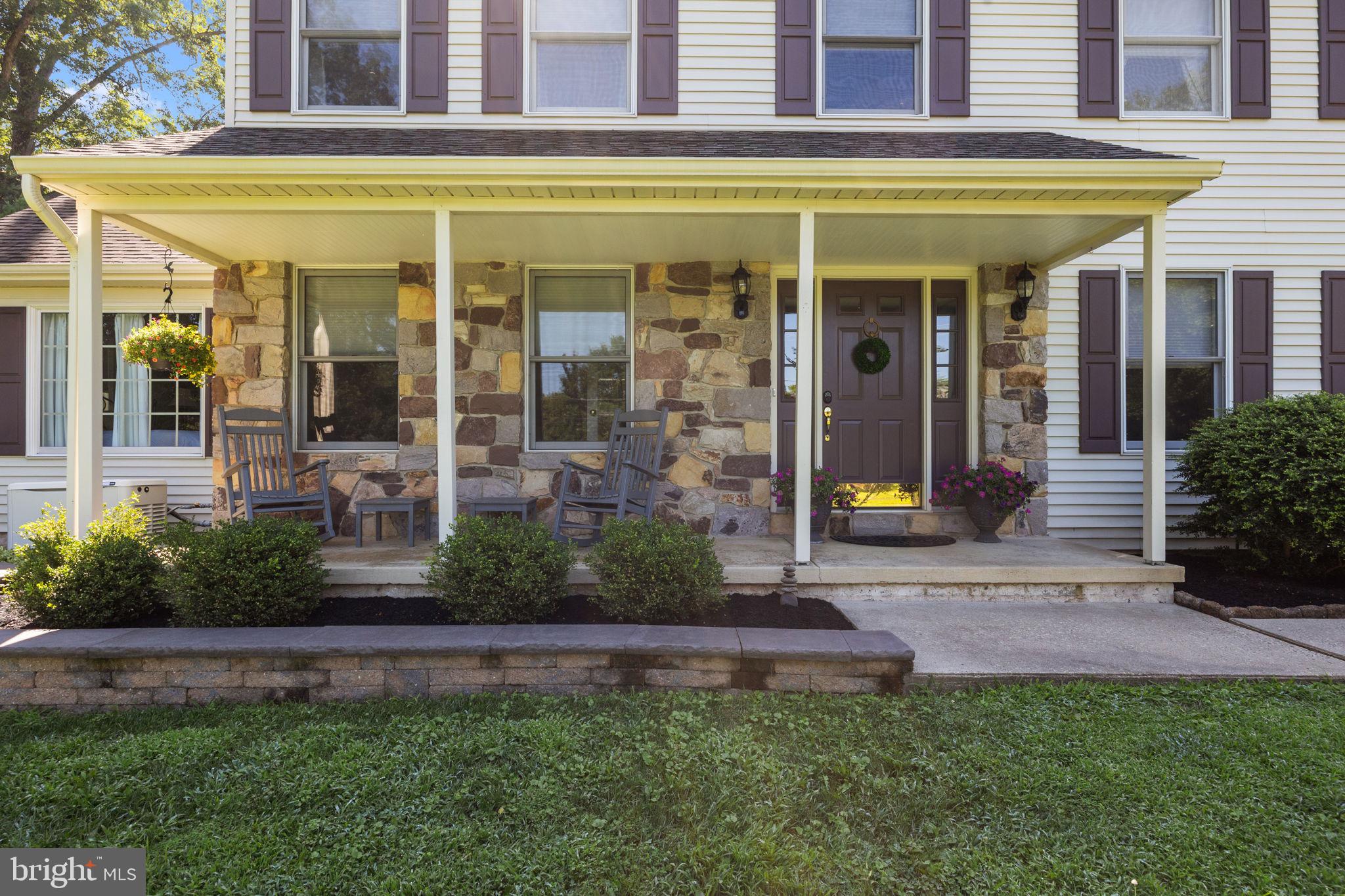 275 West Sandy Ridge Road Doylestown, PA 18901 - Photo 4 of 54 a view of a brick building with a large windows