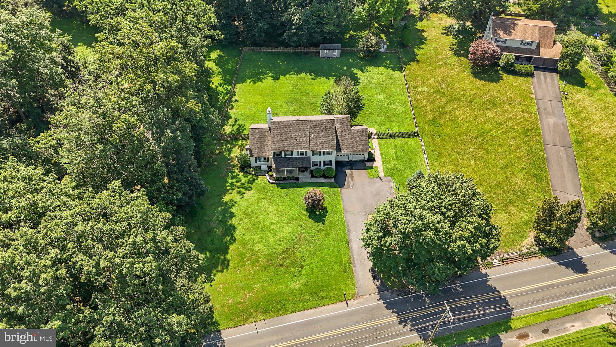 275 West Sandy Ridge Road Doylestown, PA 18901 - Photo 50 of 54 an aerial view of a house with a garden