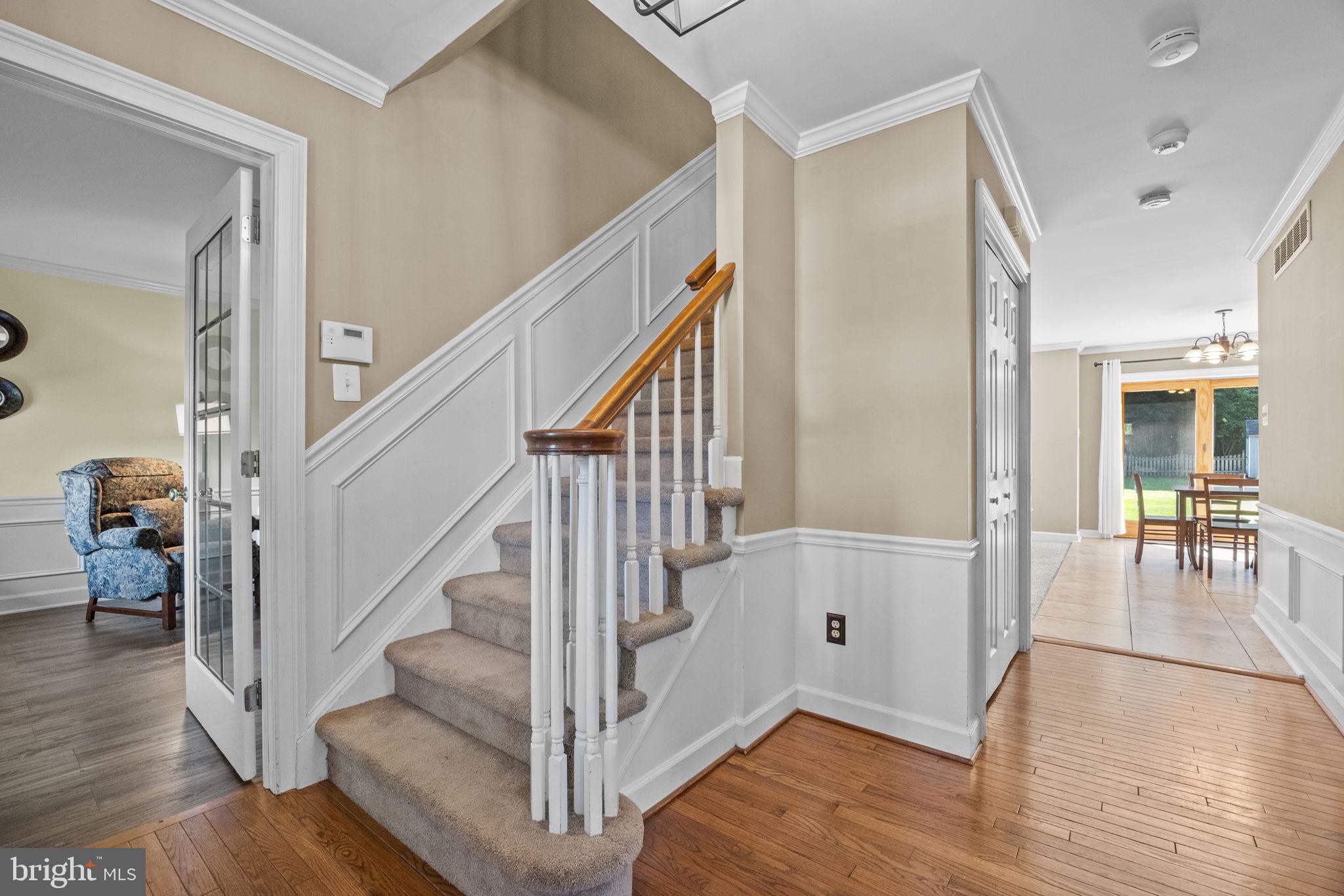 275 West Sandy Ridge Road Doylestown, PA 18901 - Photo 5 of 54 a view of an entryway with wooden floor and windows