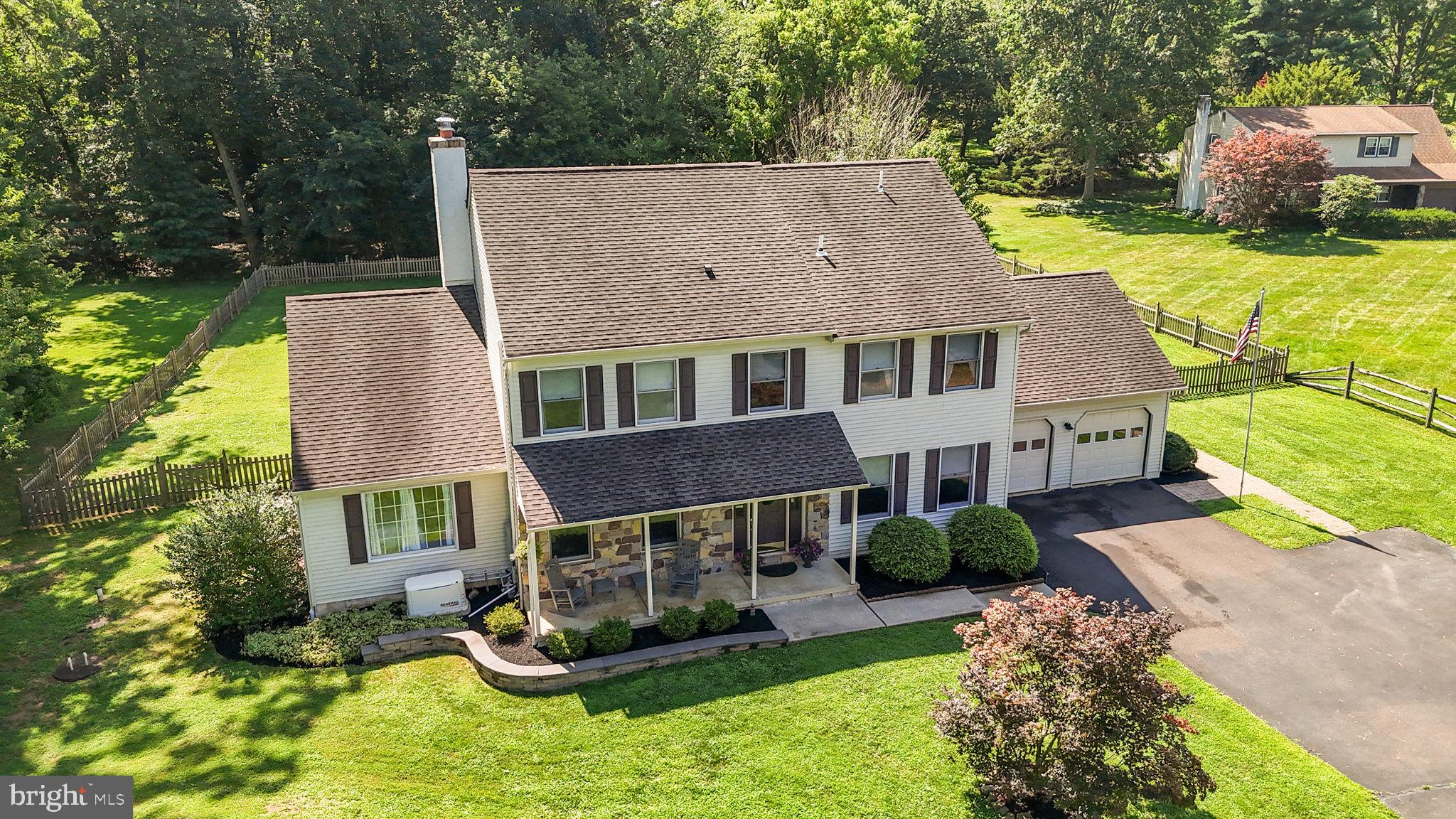 275 West Sandy Ridge Road Doylestown, PA 18901 - Photo 54 of 54 a aerial view of a house with a yard table and chairs