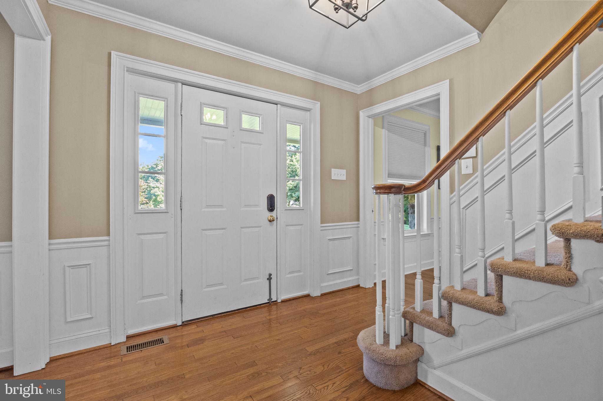 275 West Sandy Ridge Road Doylestown, PA 18901 - Photo 6 of 54 a view of entryway and hall with wooden floor