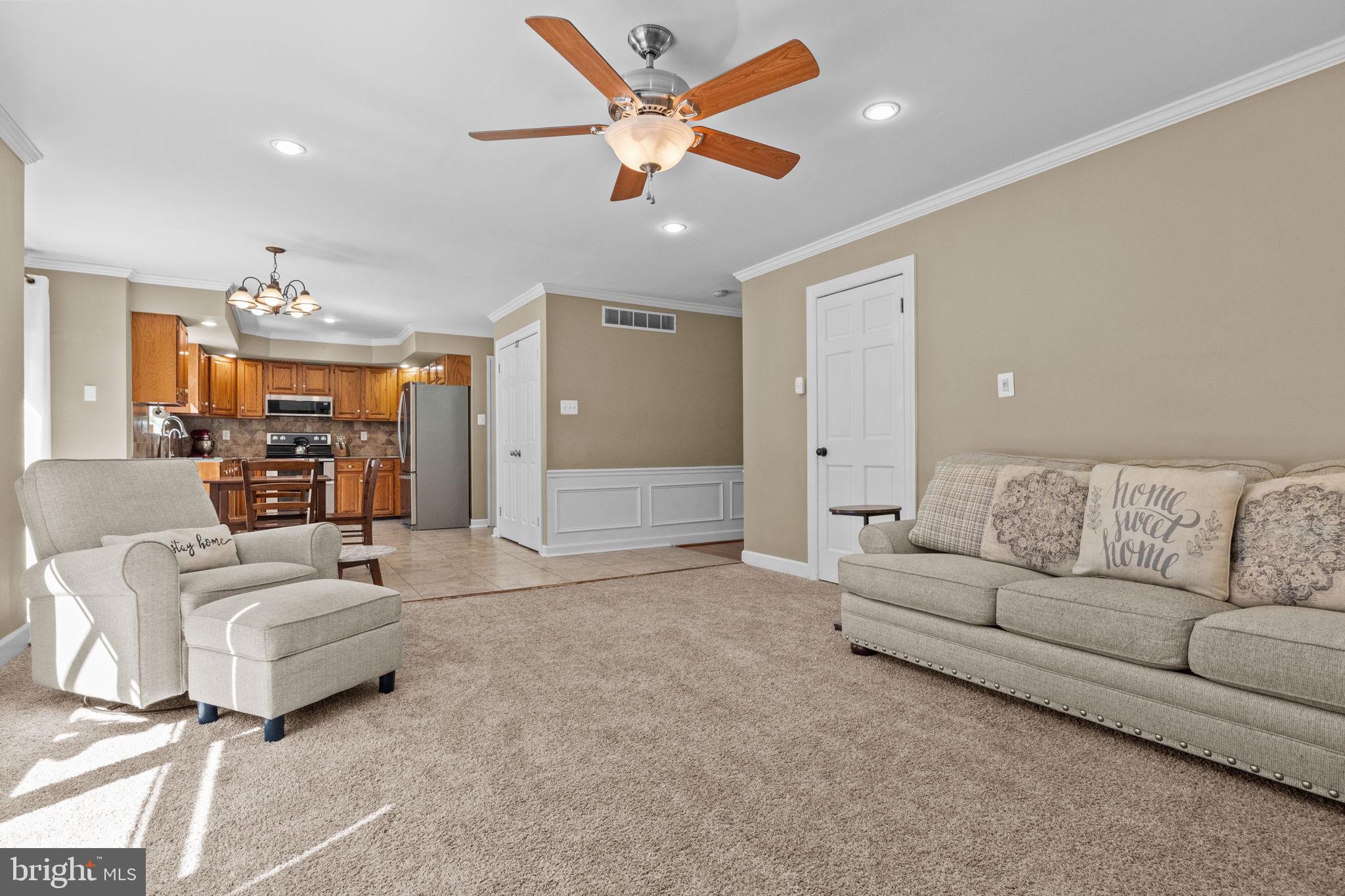 275 West Sandy Ridge Road Doylestown, PA 18901 - Photo 8 of 54 a living room with furniture and a large window