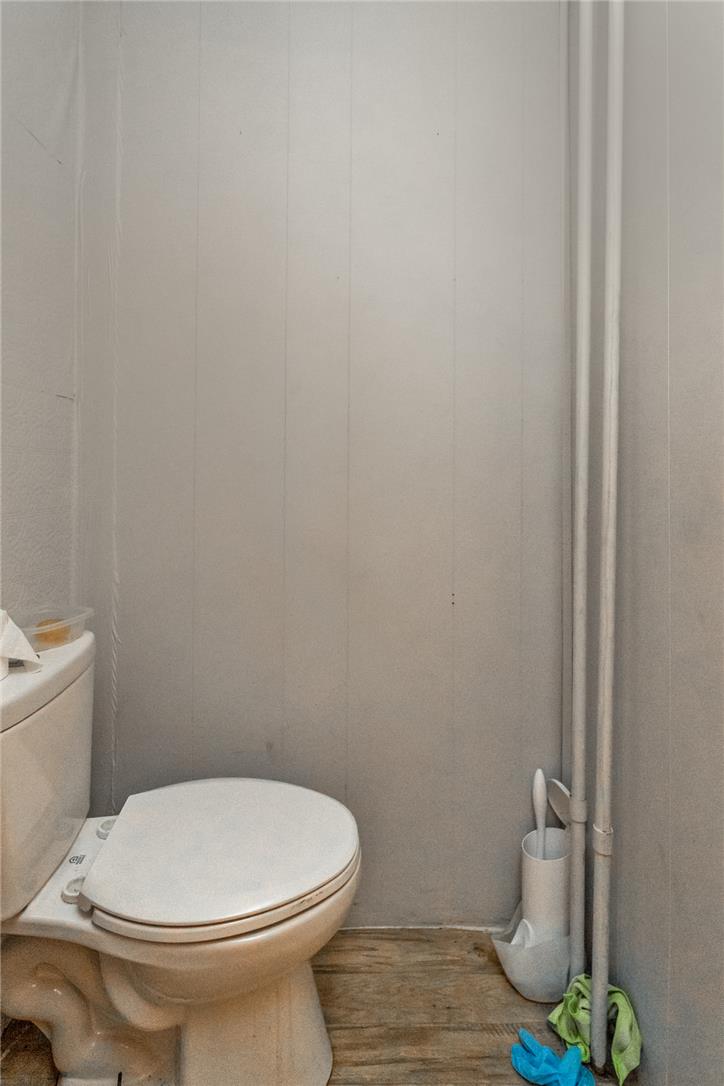 377 West Ridge Street Lansford, PA 18232 - Photo 17 of 39 This compact water closet offers essential functionality with its standard commode.