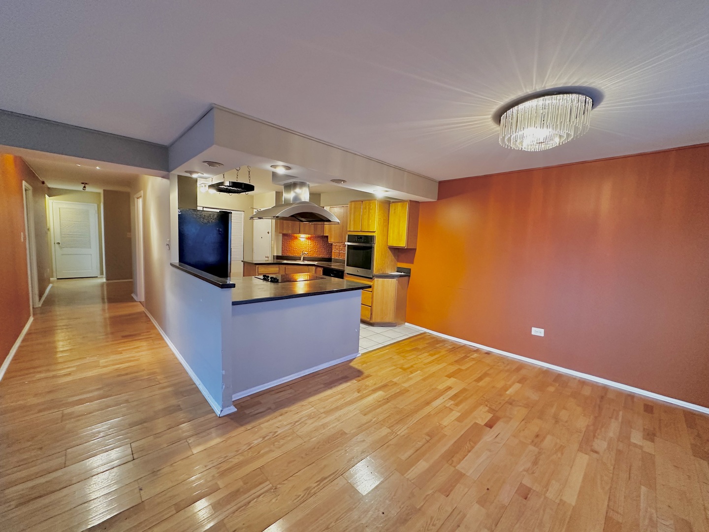 141 North La Grange Road, Unit 602 La Grange, IL 60525 - Photo 2 of 16 a kitchen with stainless steel appliances granite countertop a sink and cabinets