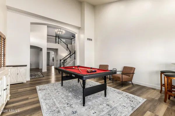 a room with furniture and wooden floor