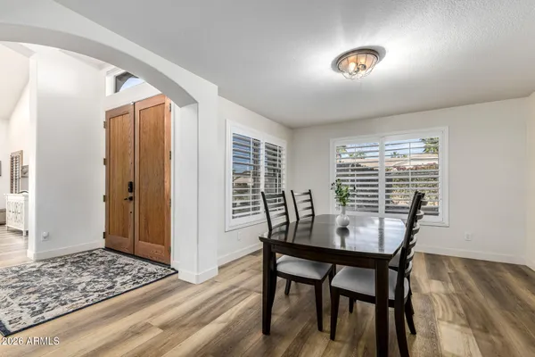 a view of a room with furniture window and wooden floor
