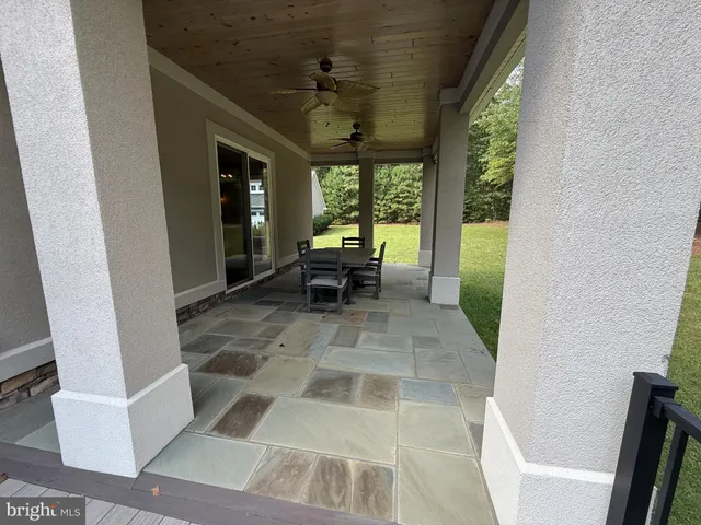 a view of living room with large windows