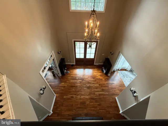a view of a livingroom with furniture and windows
