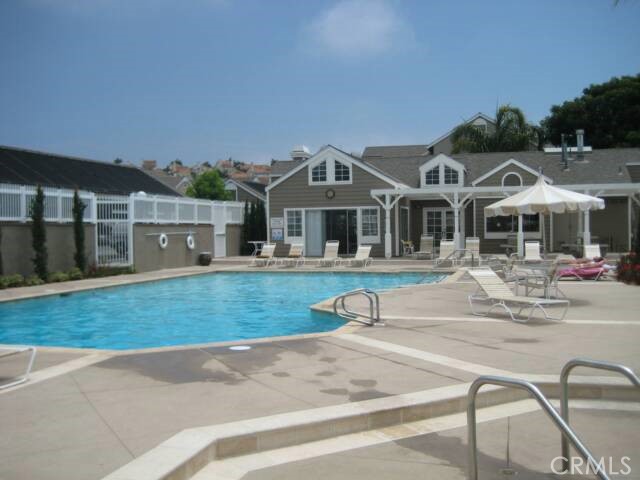 34132 Selva Road, Unit 250 Dana Point, CA 92629 - Photo 18 of 25 a front view of a house with a yard