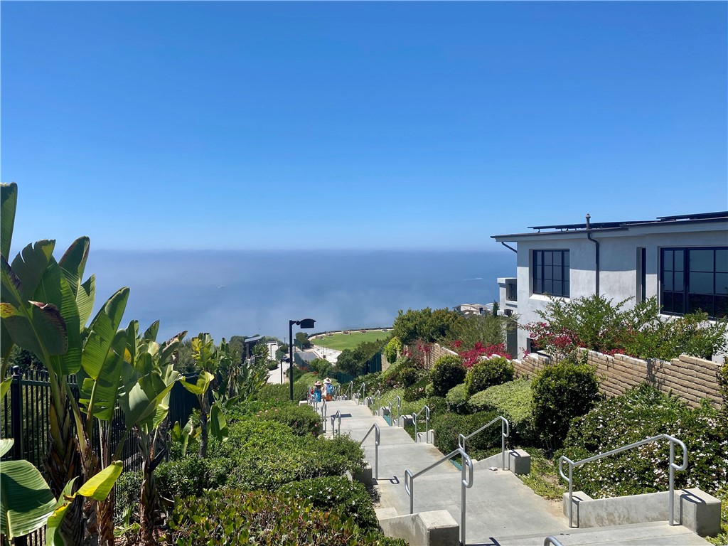 34132 Selva Road, Unit 250 Dana Point, CA 92629 - Photo 23 of 25 an aerial view of a house with a yard and outdoor seating