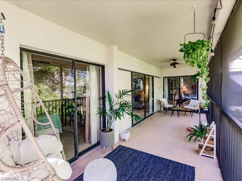 910 Vanderbilt Beach Road, Unit 524W Naples, FL 34108 - Photo 38 of 44 Balcony with ceiling fan