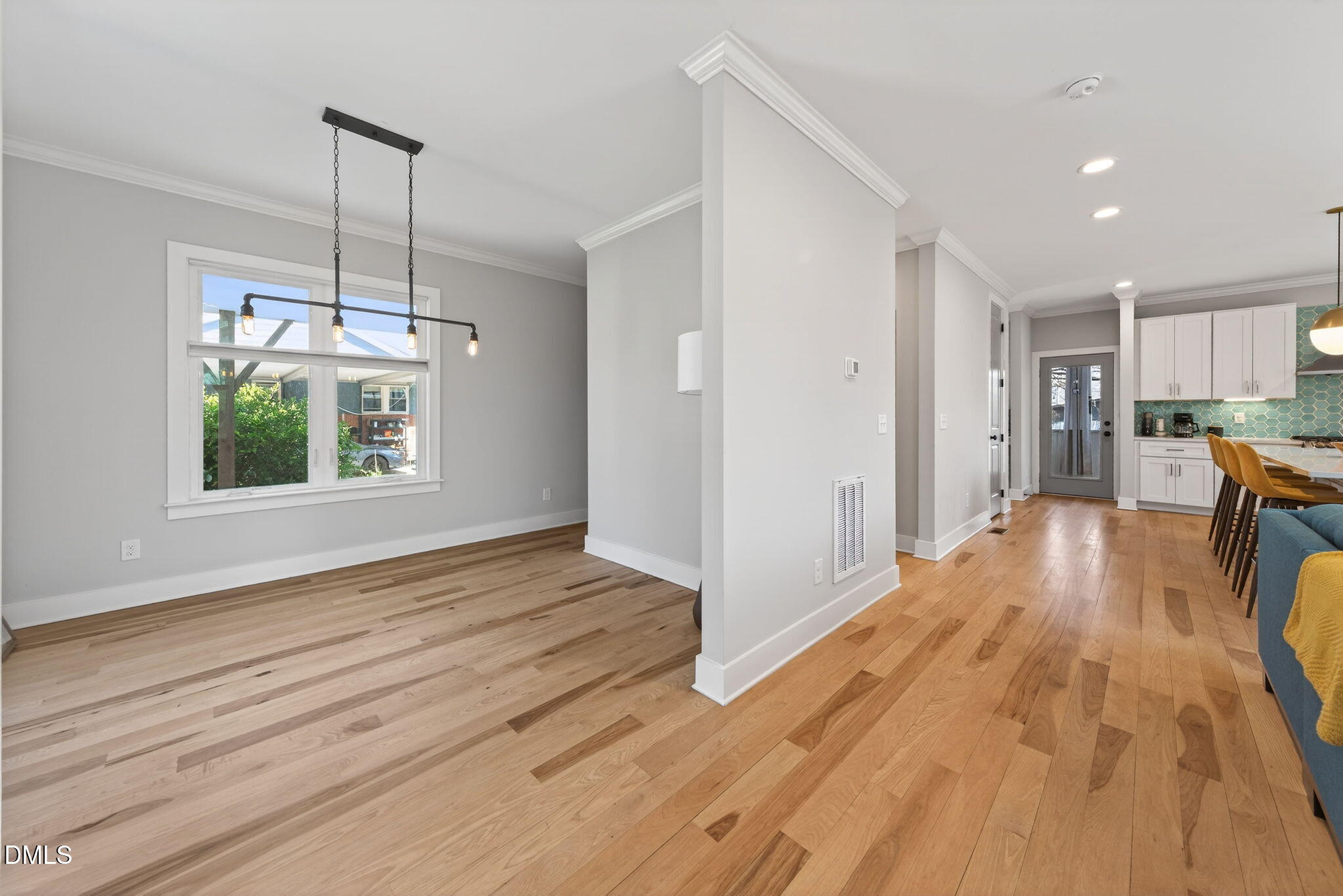213 Lincoln Court Raleigh, NC 27610 - Photo 9 of 40 a view of a room with wooden floor and a window