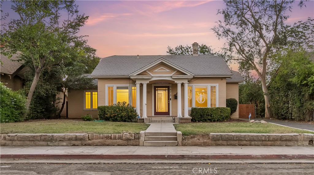 4473 Main Street Riverside, CA 92501 - Photo 1 of 1 a front view of a house with a yard