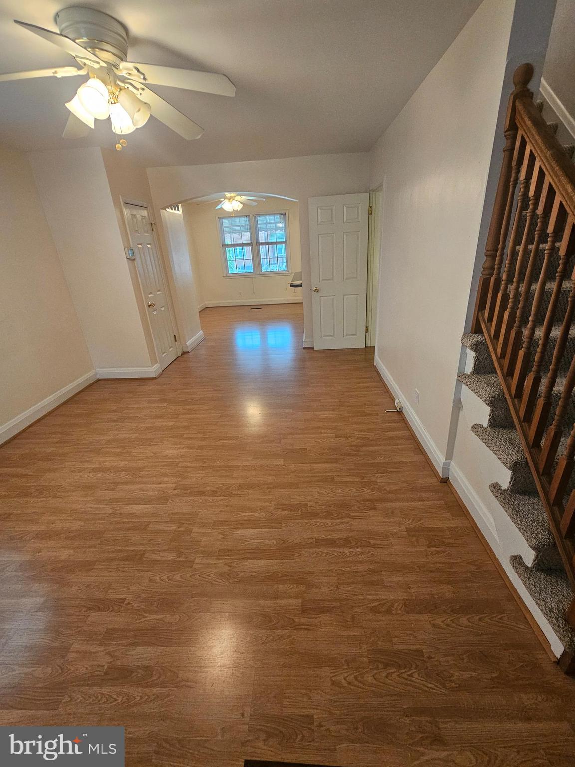 6907 Belclare Road Baltimore, MD 21222 - Photo 8 of 26 a view of an empty room and window