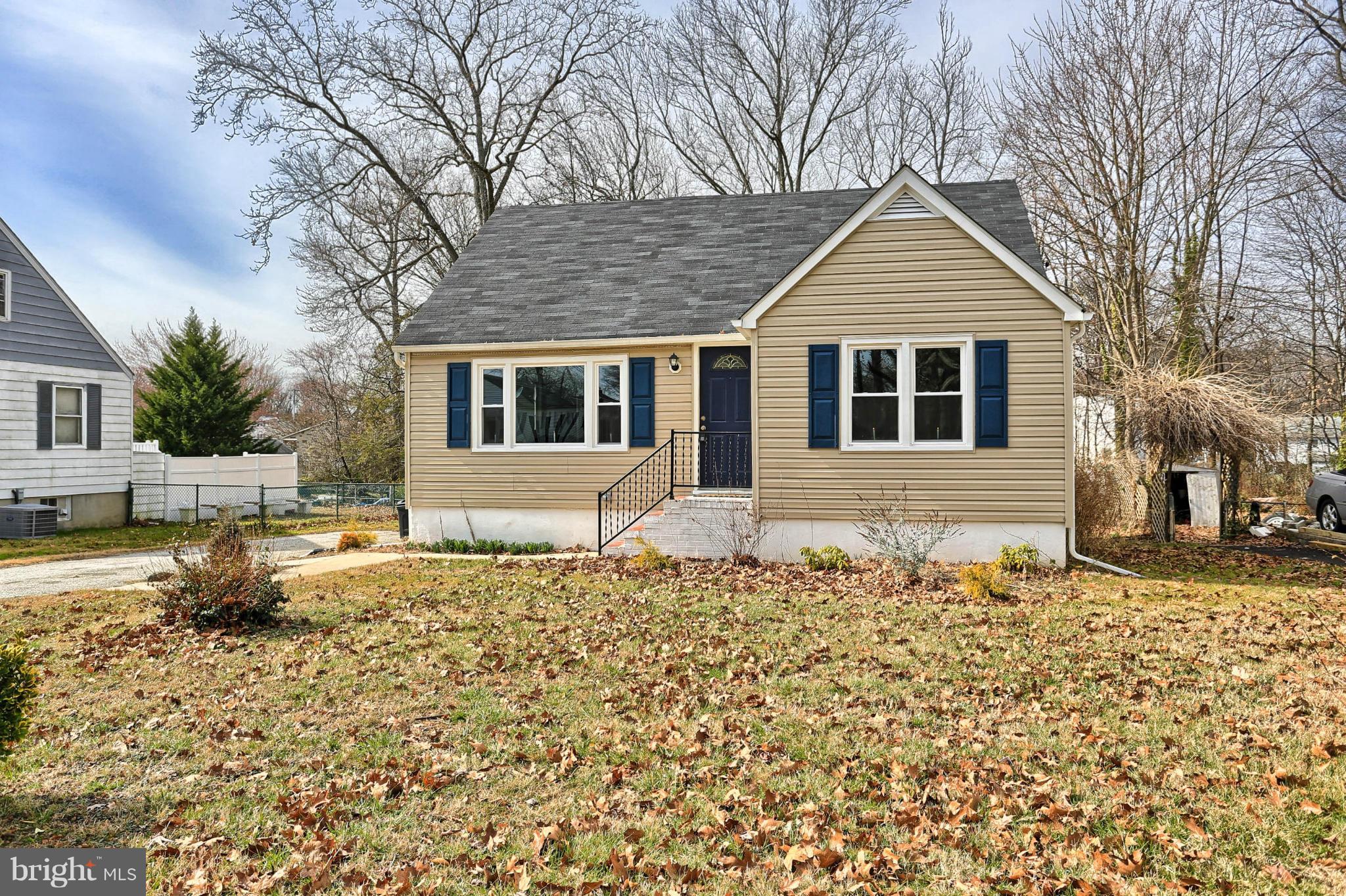 220 W Road Baltimore, MD 21221 - Photo 2 of 30 a front view of a house with a yard