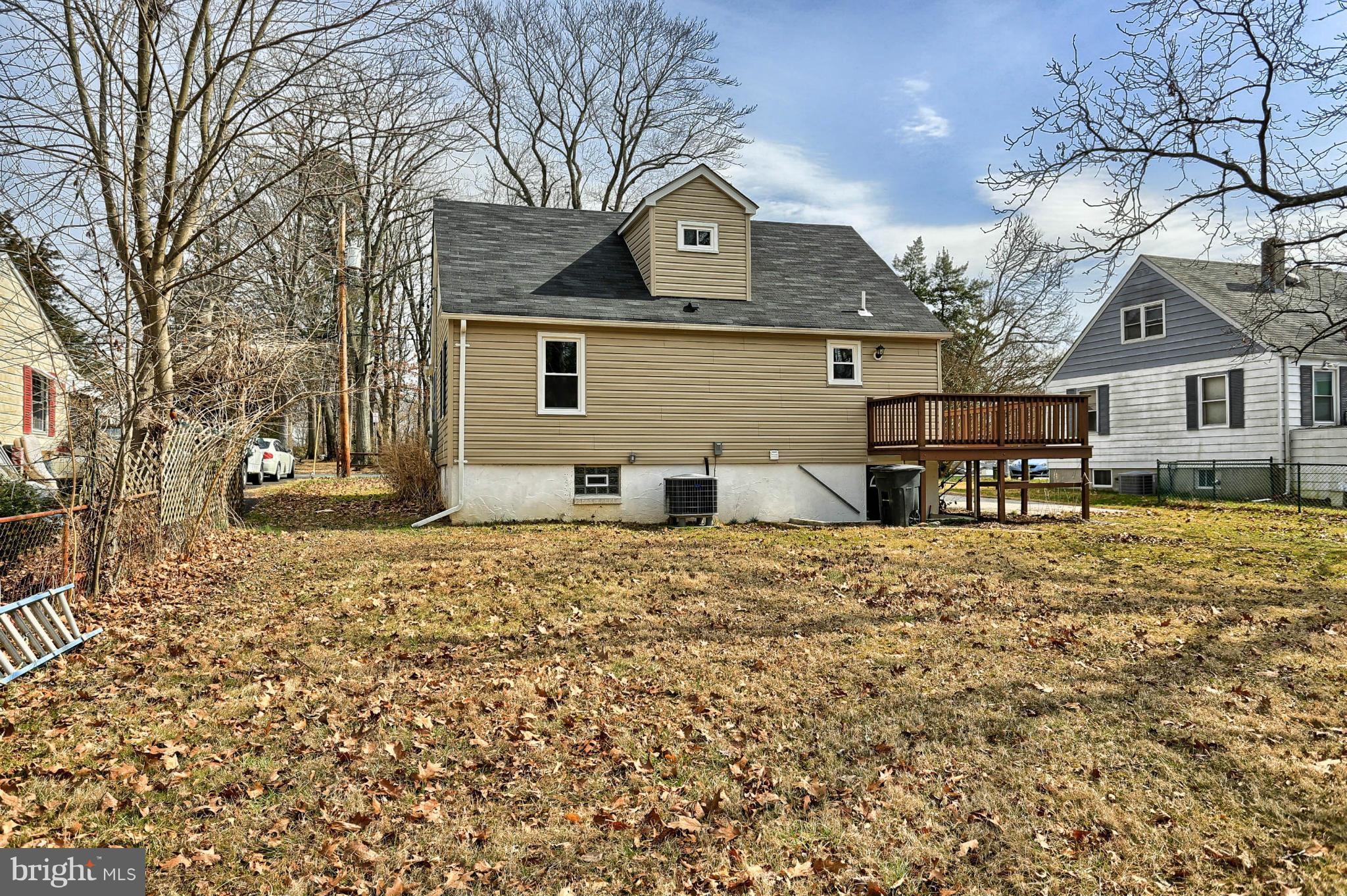 220 W Road Baltimore, MD 21221 - Photo 27 of 30 a front view of a house with a yard and garage