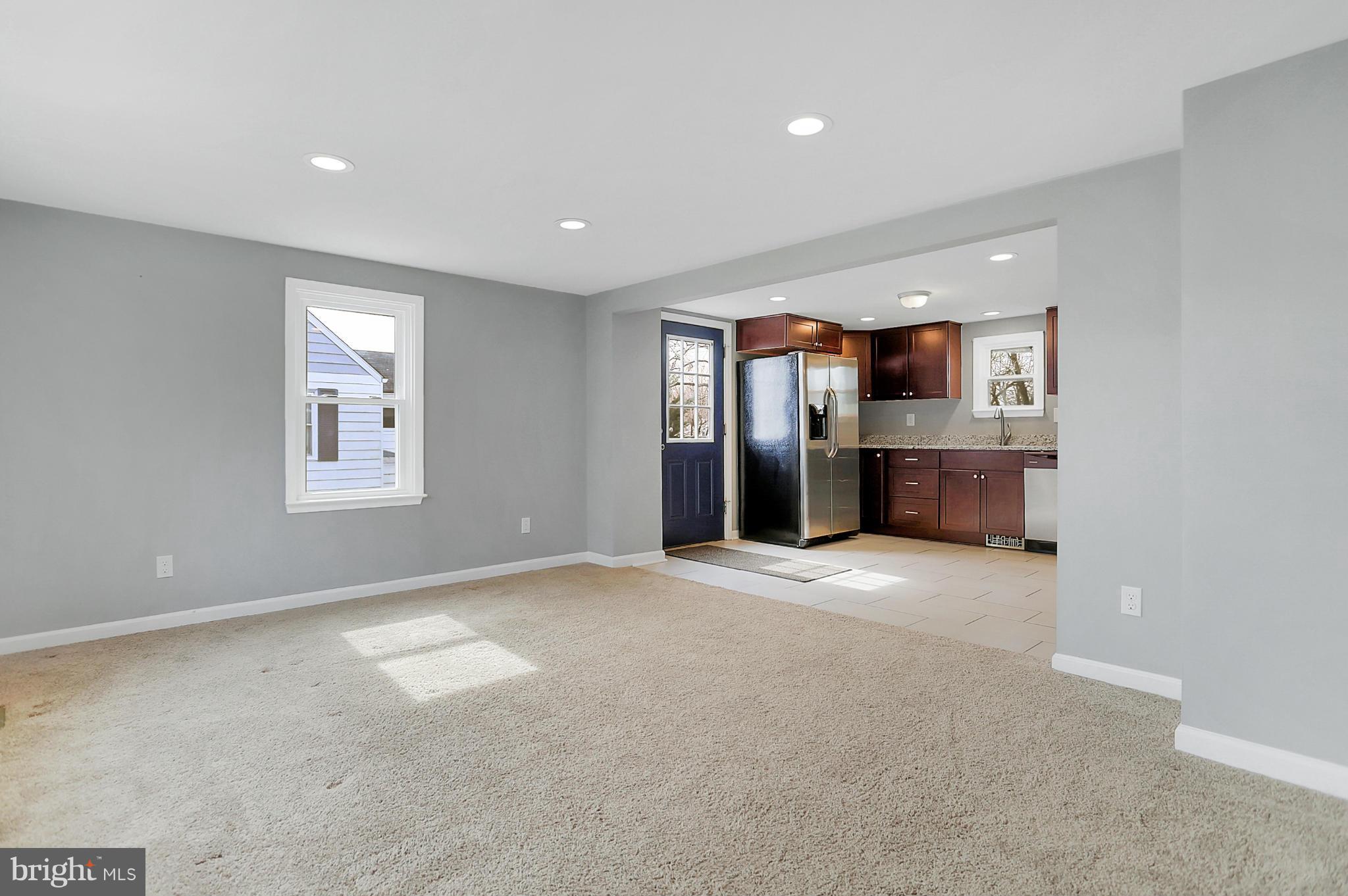 220 W Road Baltimore, MD 21221 - Photo 4 of 30 a view of a kitchen with a sink and natural light