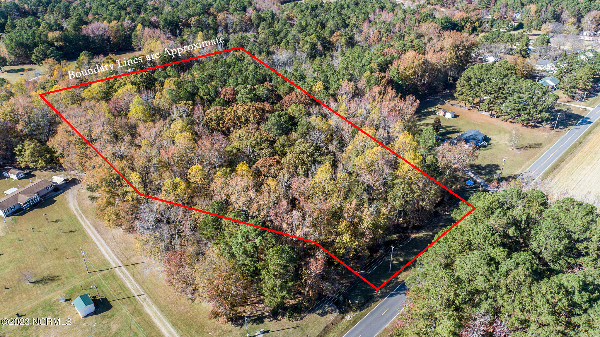 6033 Homestead Road Elm City, NC 27822 - Photo 3 of 20 6033-Front-left-wLines