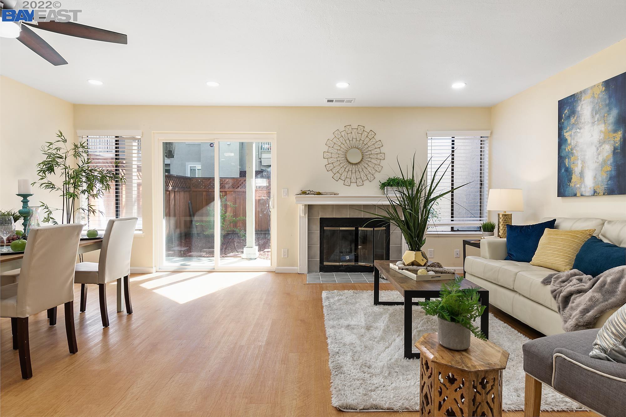 3893 Crow Canyon Road San Ramon, CA 94582 - Photo 1 of 1 a living room with furniture and a fireplace