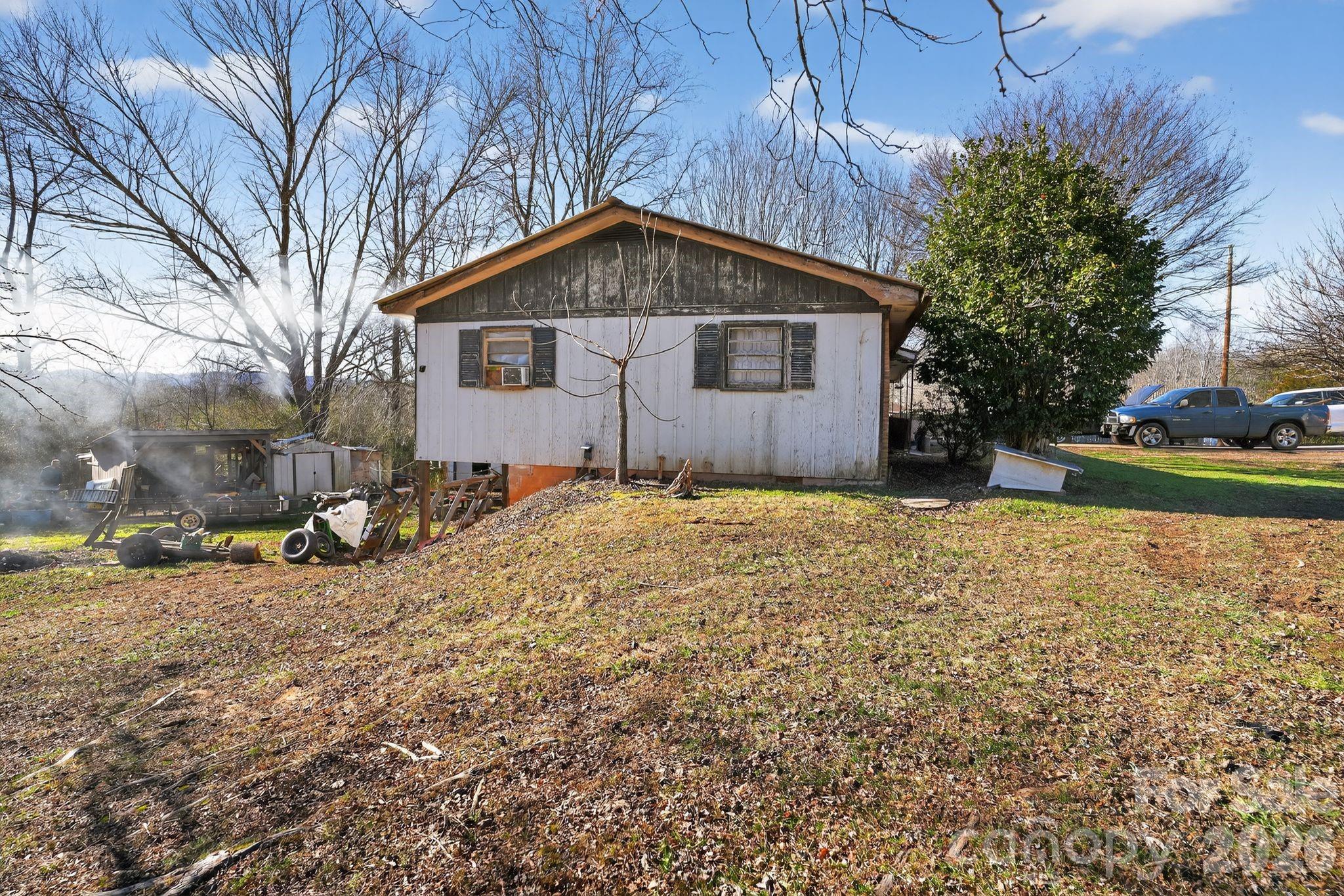 1124 Walshtown Road Boomer, NC 28606 - Photo 14 of 15 a front view of a house with a yard