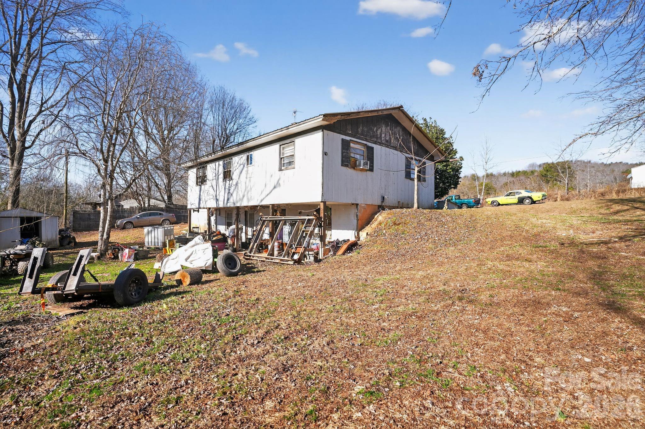 1124 Walshtown Road Boomer, NC 28606 - Photo 15 of 15 a view of a house with a snow on the road