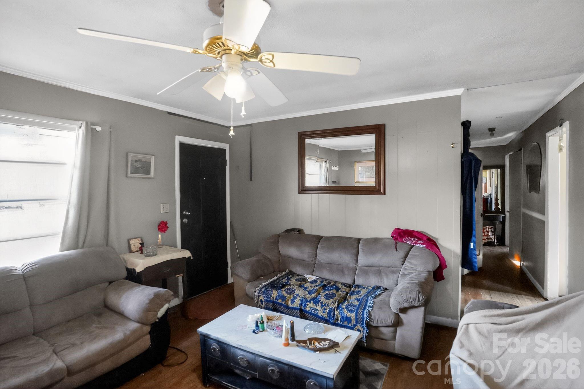 1124 Walshtown Road Boomer, NC 28606 - Photo 4 of 15 a living room with furniture and a window