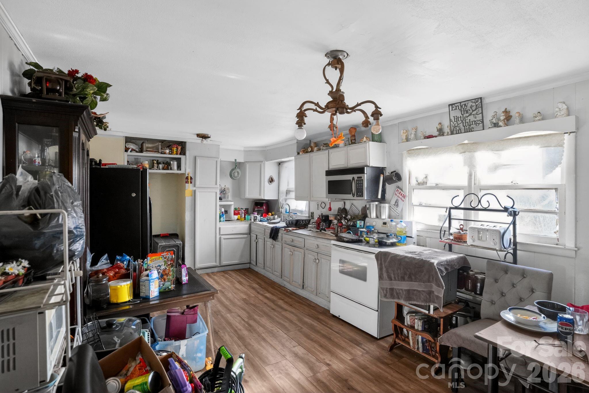 1124 Walshtown Road Boomer, NC 28606 - Photo 7 of 15 a view of a kitchen and dining room