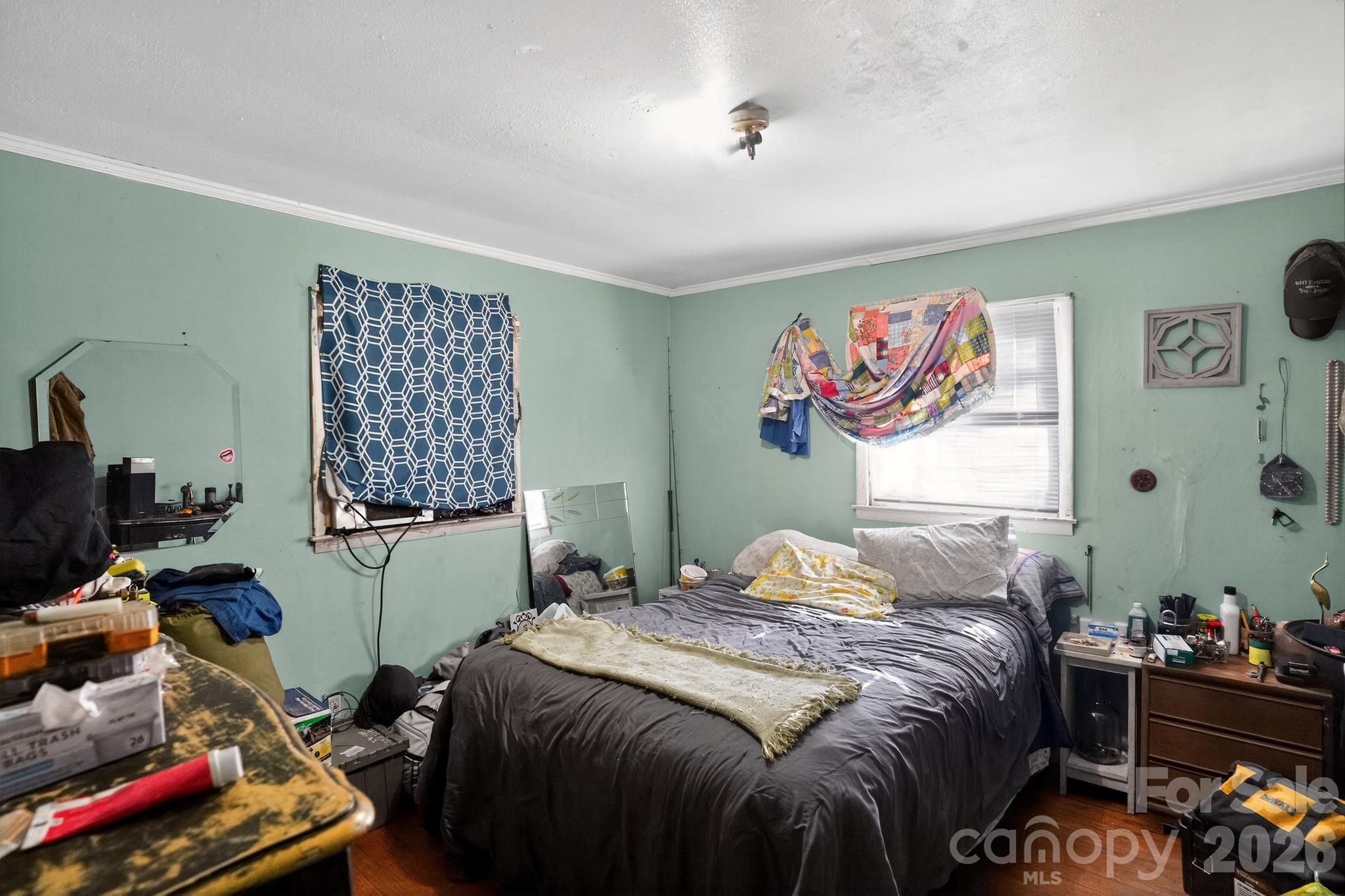 1124 Walshtown Road Boomer, NC 28606 - Photo 9 of 15 a bedroom with a bed and a window