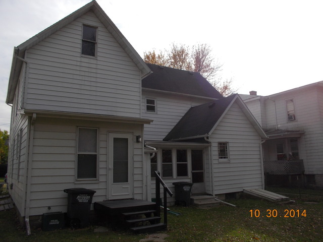 719 West 2nd Street Dixon, IL 61021 - Photo 2 of 8 a view of a house with a yard