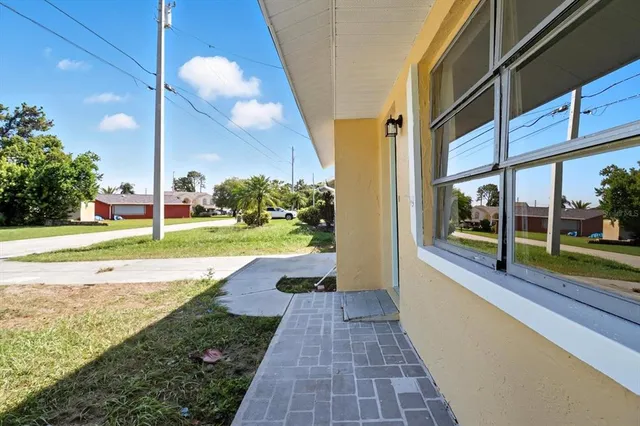 a view of a building with yard
