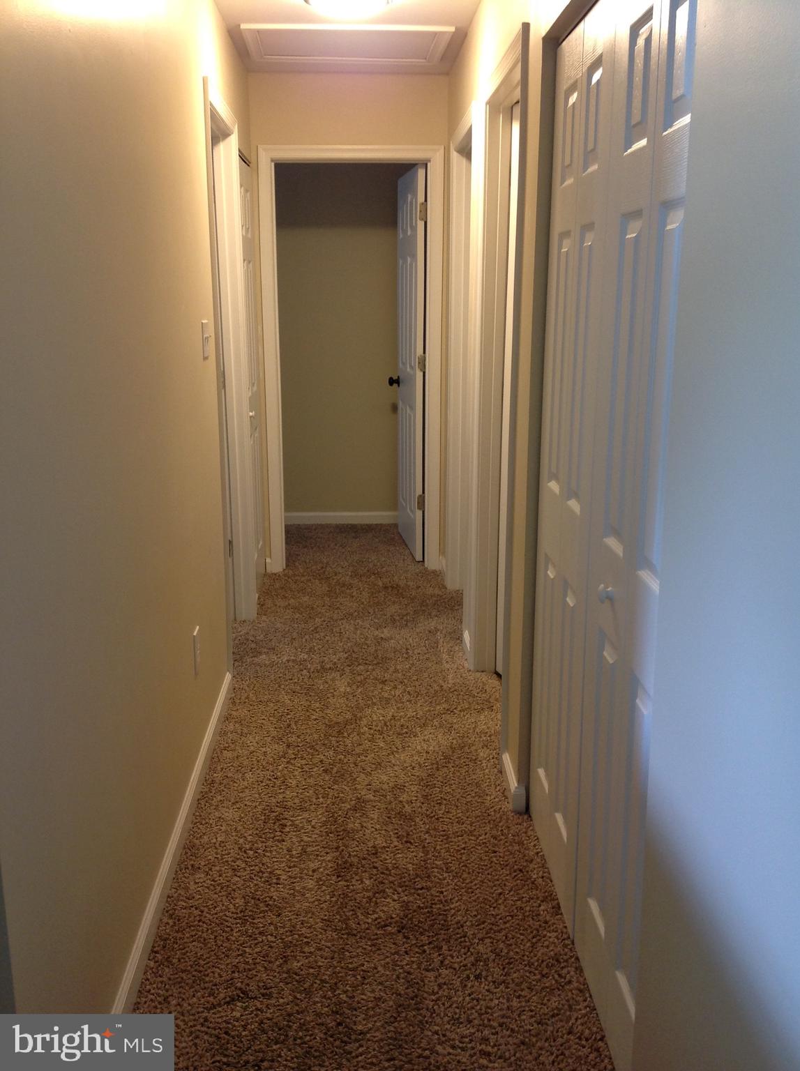 970 Point Pleasant Road Glen Burnie, MD 21060 - Photo 16 of 44 Hallway to three bedrooms