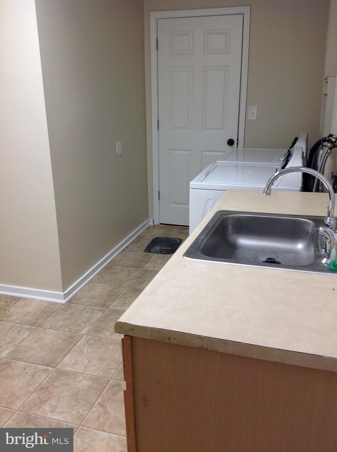 970 Point Pleasant Road Glen Burnie, MD 21060 - Photo 26 of 44 Lower level has a sink and countertop