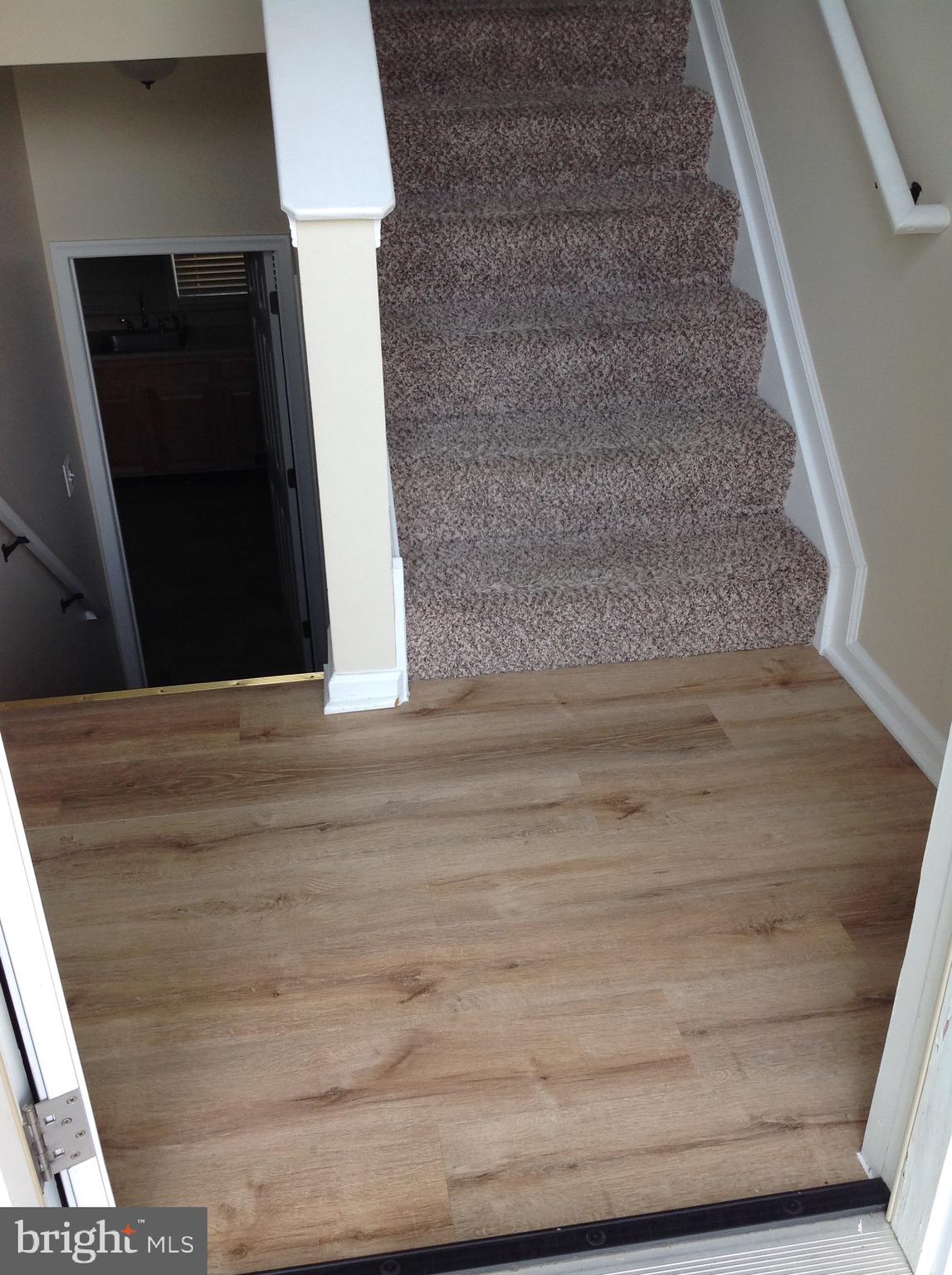 970 Point Pleasant Road Glen Burnie, MD 21060 - Photo 4 of 44 Entry with new flooring and new carpet