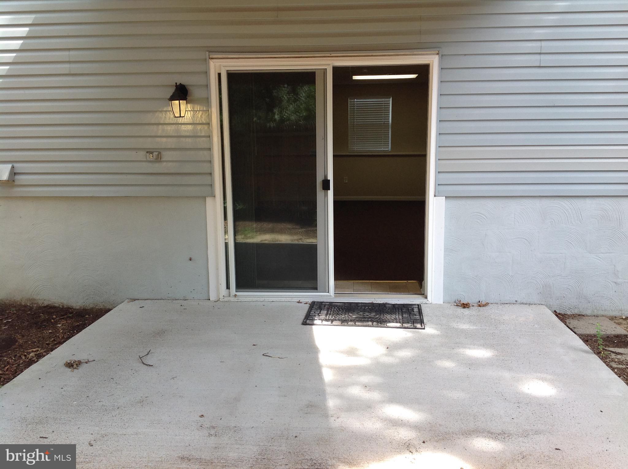 970 Point Pleasant Road Glen Burnie, MD 21060 - Photo 36 of 44 sliding glass door off patio into lower level