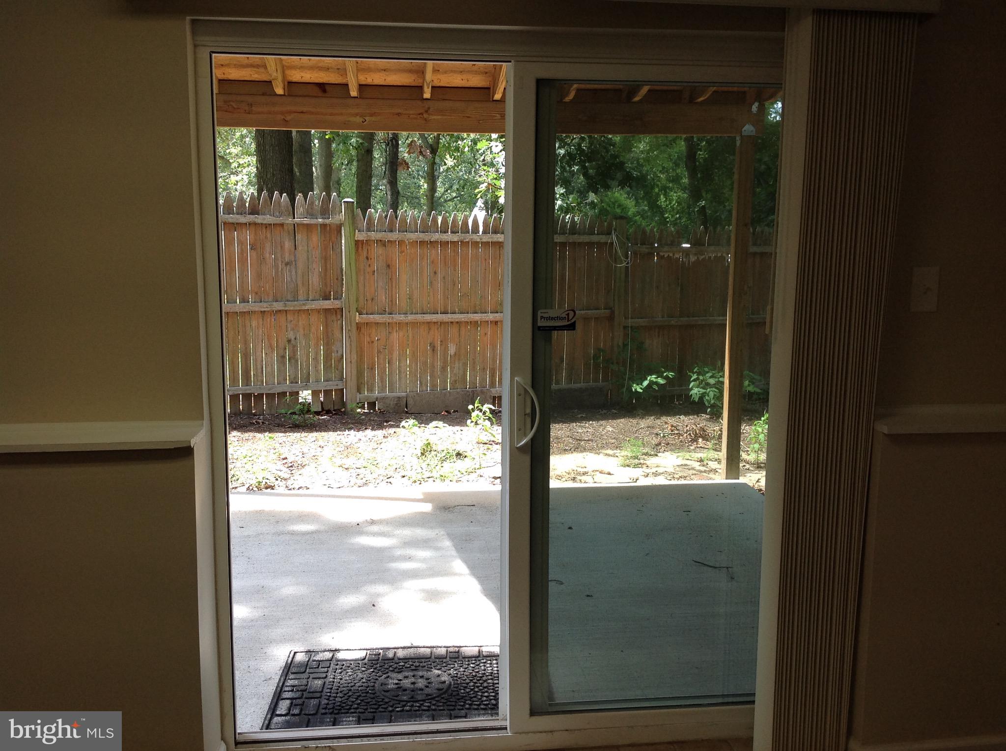 970 Point Pleasant Road Glen Burnie, MD 21060 - Photo 37 of 44 Sliding glass doors leading onto patio,