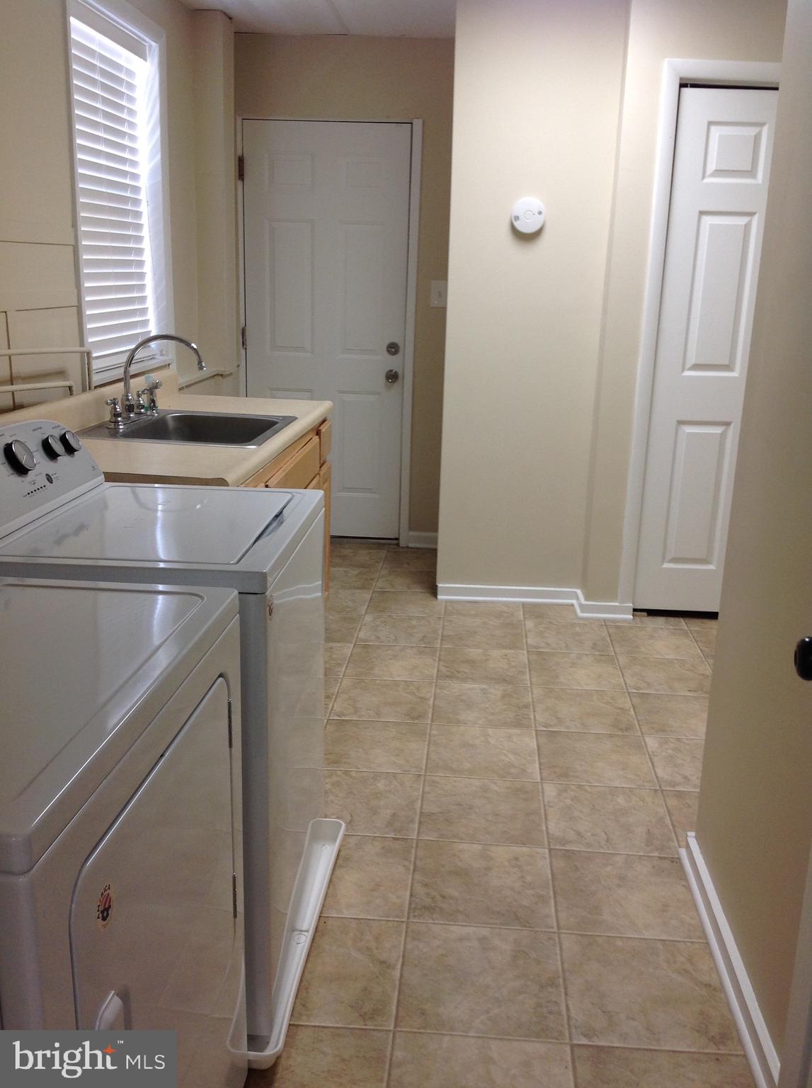 970 Point Pleasant Road Glen Burnie, MD 21060 - Photo 39 of 44 View of laundry room and garage entrance