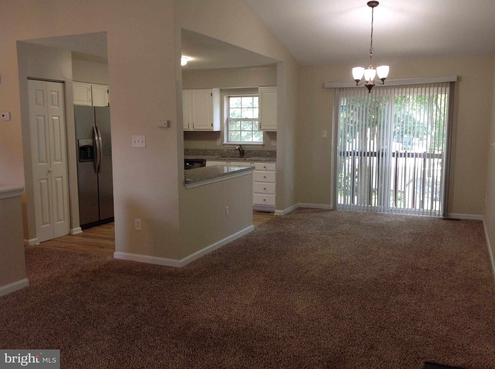 970 Point Pleasant Road Glen Burnie, MD 21060 - Photo 10 of 44 View from the living room into dining and kitchen