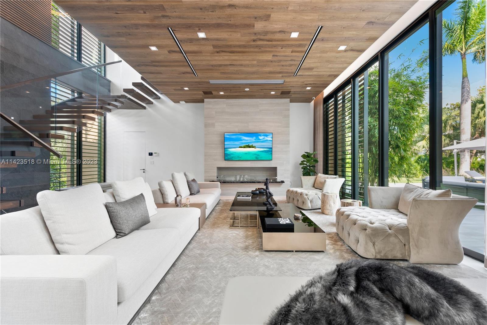 2690 Hackney Road Weston, FL 33331 - Photo 27 of 88 a living room with furniture and a flat screen tv