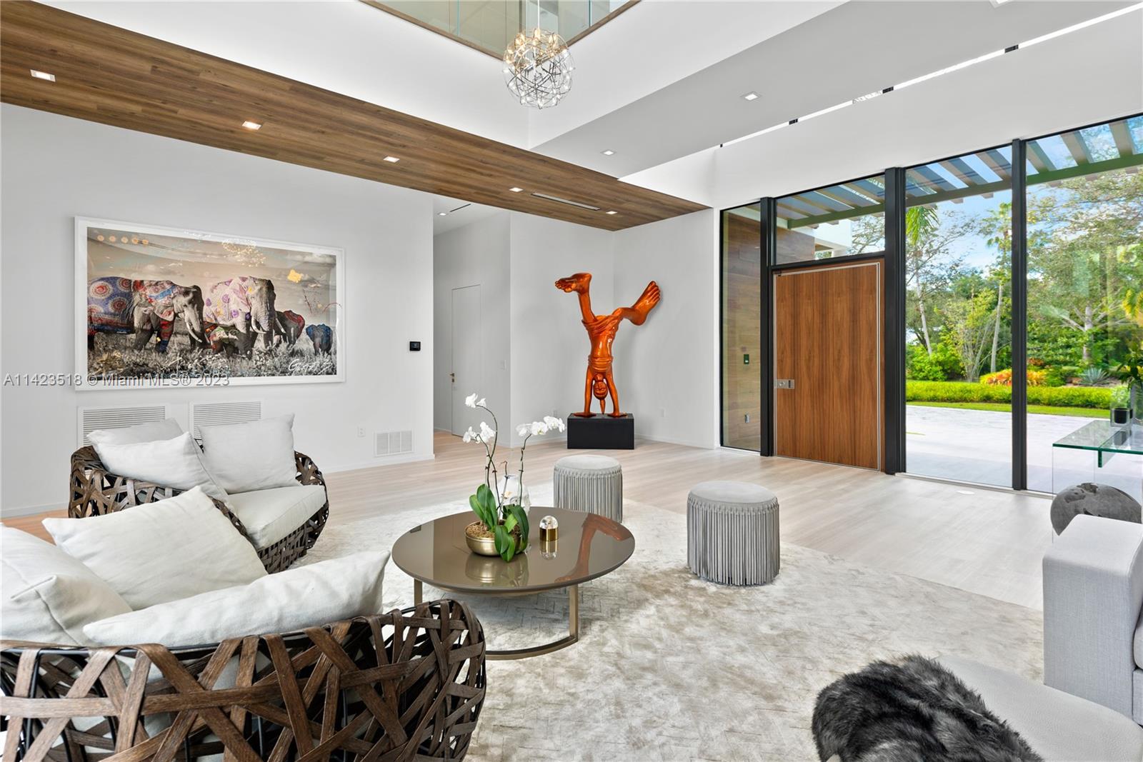 2690 Hackney Road Weston, FL 33331 - Photo 28 of 88 a living room with furniture and a large window