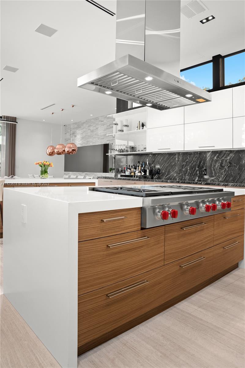 2690 Hackney Road Weston, FL 33331 - Photo 41 of 88 a kitchen with stainless steel appliances granite countertop a sink and a stove