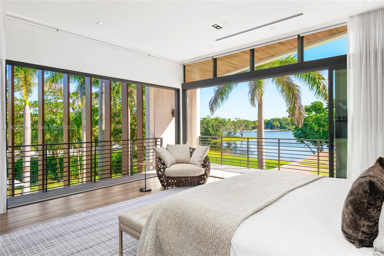 2690 Hackney Road Weston, FL 33331 - Photo 46 of 88 a bedroom with a bed and a large window