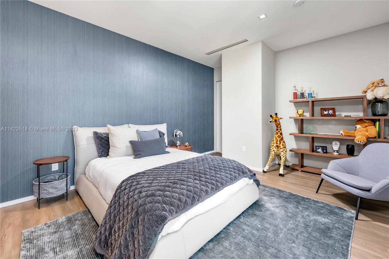 2690 Hackney Road Weston, FL 33331 - Photo 60 of 88 a bedroom with a bed a chair and potted plant on dresser