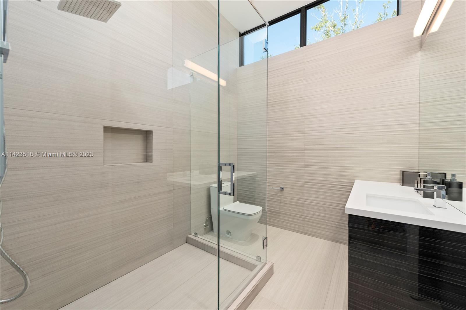 2690 Hackney Road Weston, FL 33331 - Photo 61 of 88 a bathroom with a sink a toilet and shower