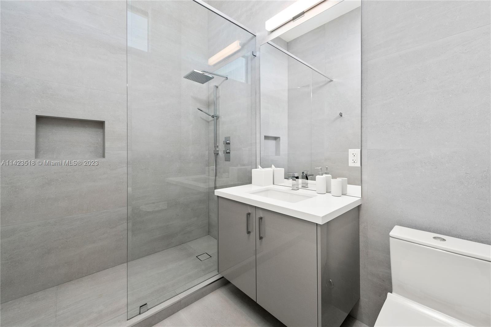 2690 Hackney Road Weston, FL 33331 - Photo 63 of 88 a bathroom with a sink toilet and shower