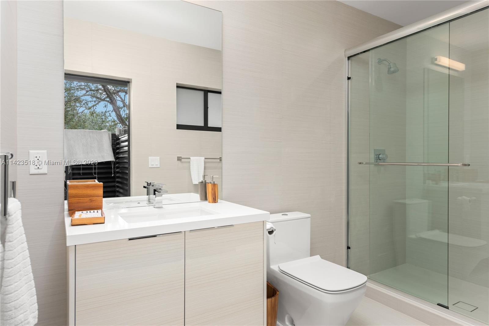 2690 Hackney Road Weston, FL 33331 - Photo 69 of 88 a bathroom with a sink a toilet and shower